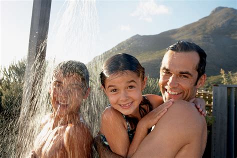 Father/daughter showering together